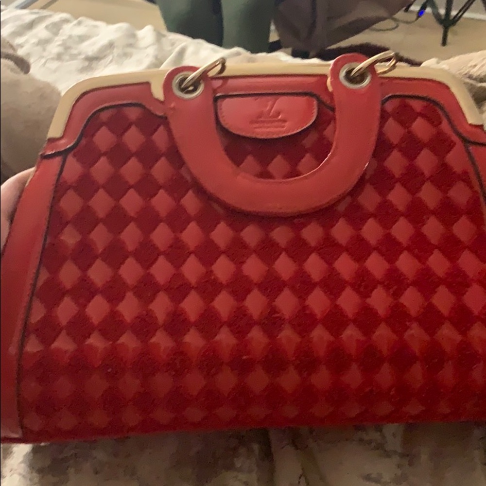Vintage Louis Vuitton purse bidding